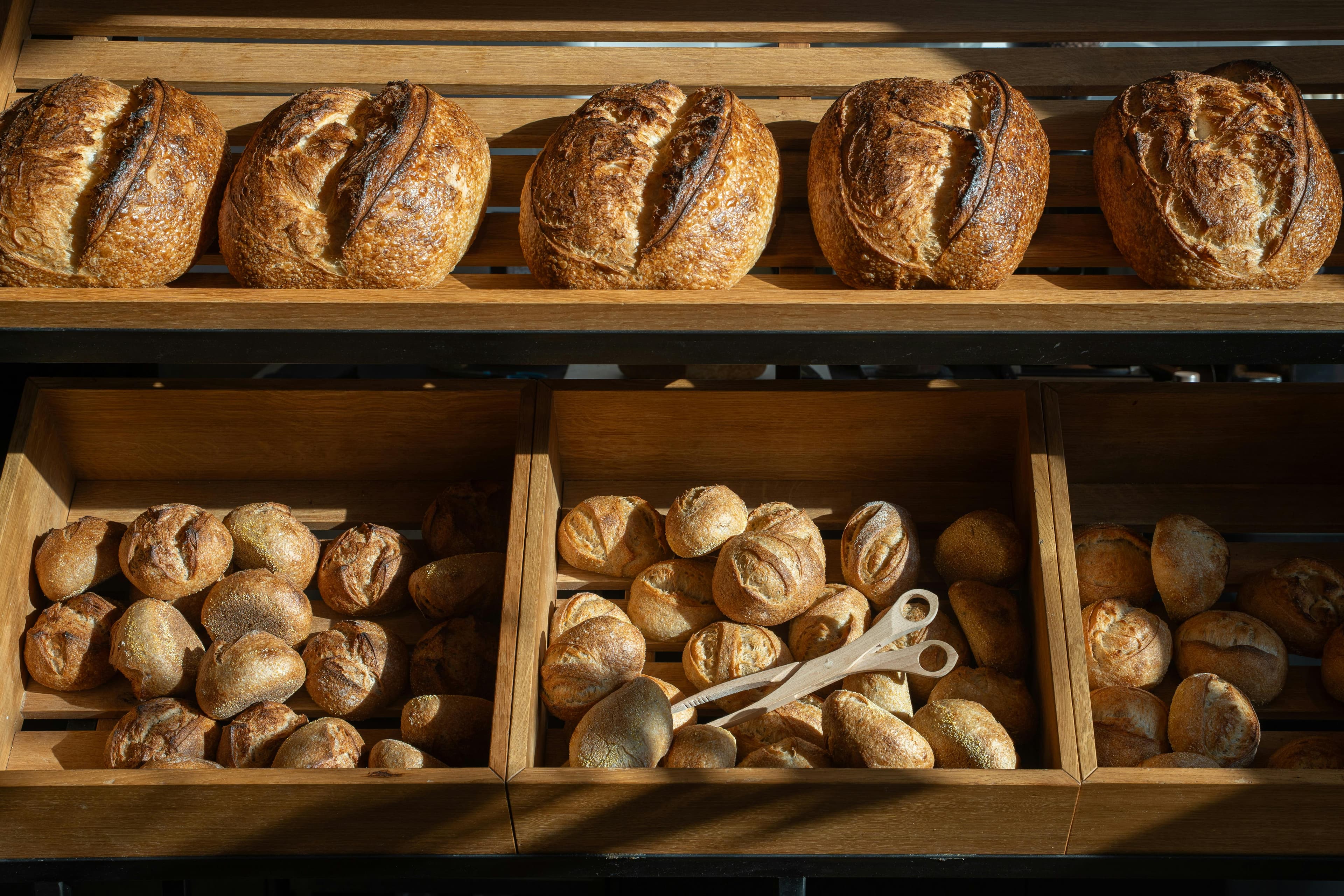 Artisan bread on wooden shelves